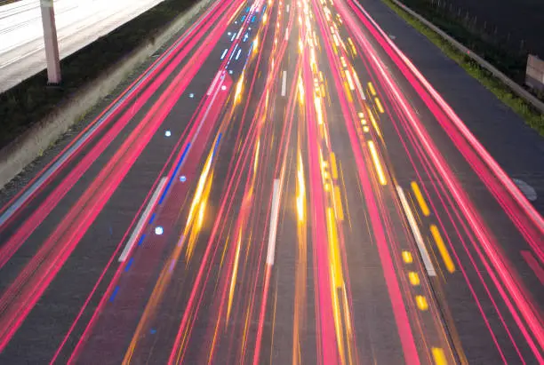 Traffic at Night - A long exposure of chaotic lighttrails on the motorway.