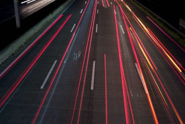 istock Traffic on a Highway at Night - Long - Light Trails 1032469390