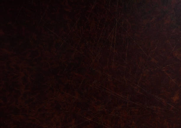 istock Old dark brown wooden background with scratches. Table texture. 1032473280