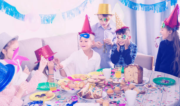 istock happy kids having a good time at a birthday party 1032476638