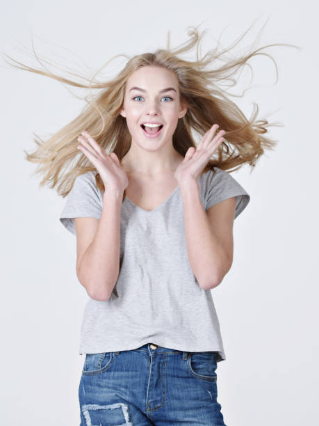 istock Girl with long blond hair 1032476888