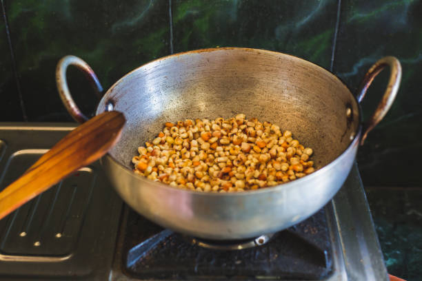 istock Corn Frying on the gas stove in the kitchen 1032479198