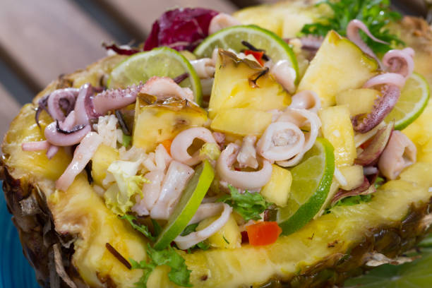istock Salad with calamari, pineapple and lime 1032480078