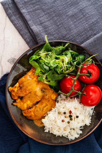 istock delicious Rice and chicken on plate 1032489604