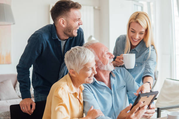 istock Family looking at an old photograph 1032489768