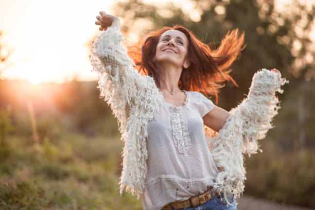 istock Cheerful mature woman feeling youthful 1032496158