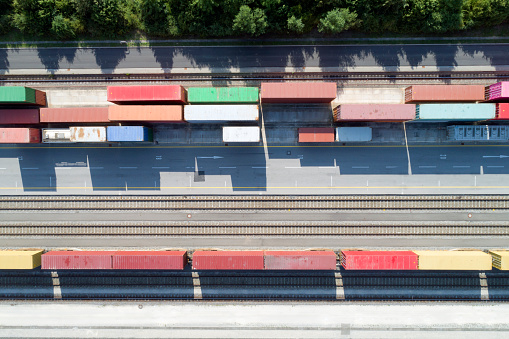Aerial view of cargo containers and freight trains, Baden Wurttemberg, Germany