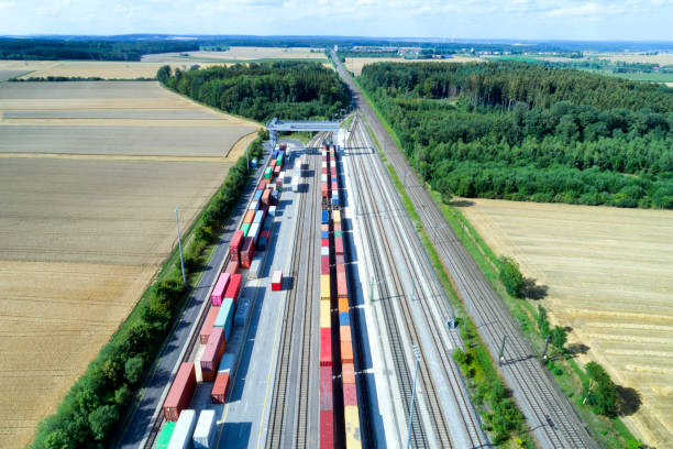 istock Cargo Containers and Freight Trains, Aerial View 1032503836