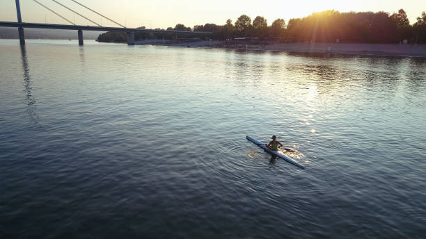 foto drone di kayaker professionista femminile - women courage water floating on water foto e immagini stock