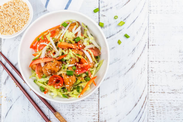 Salmon and vegetables asian salad stock photo