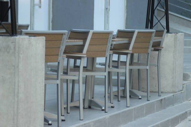 istock Outdoor tall wooden cafe chairs 1032513768