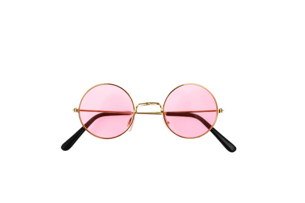 istock Golden frame sunglasses with pink lens isolated on white background, top view 1032515862