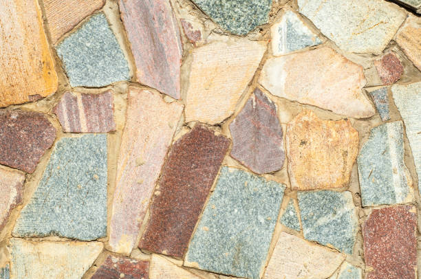 istock Texture background image, granite stone is complex in the fence. Stone wall, background from plate. Abstract granite from the wall texture 1032527756