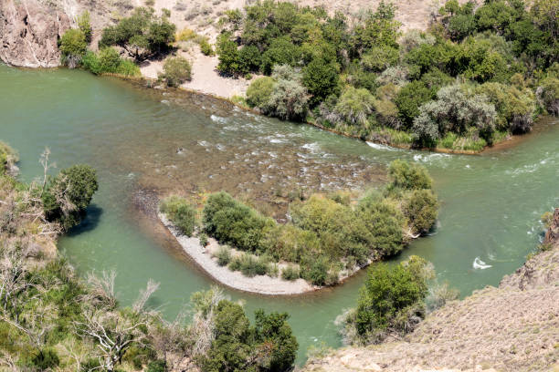 istock Charyn River flows within the Charyn Canyon and provides a fertile shore with its water. The canyon is also called valley of castles and is located east of Almaty in Kazakhstan. 1032532842