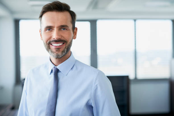 istock Potrait of a happy office worker looking at camera 1032536078