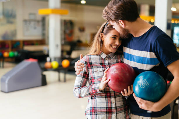 istock Beautiful couple dating and bowling 1032538440