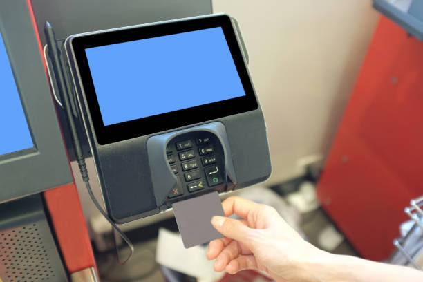 istock Woman's hand making payment with credit card 1032543826