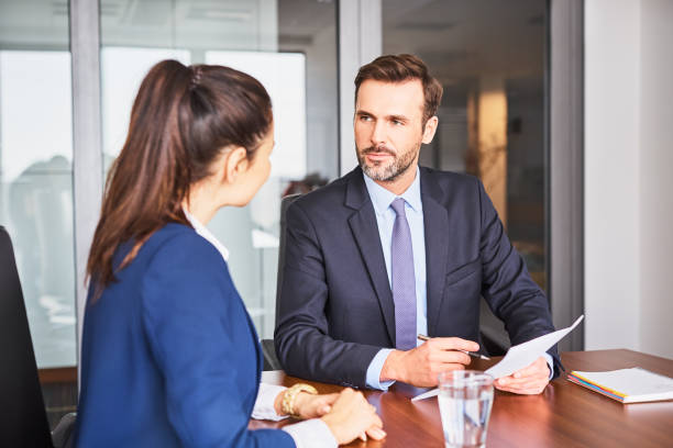 istock Recruiter during business job interview in office with female candidate 1032555946