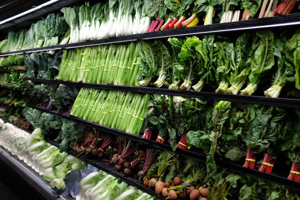 istock Organic vegetable aisle in grocery store 1032557108
