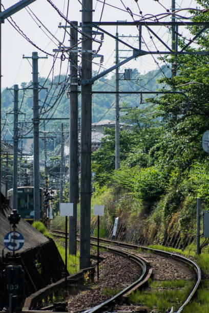 istock Green train on Railway Kyoto Japan 1032557424