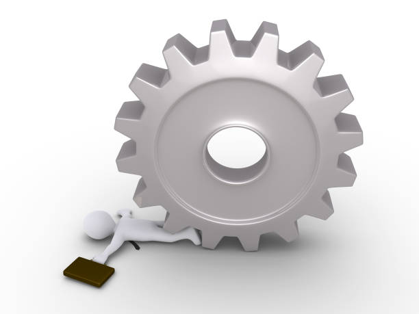 istock Businessman crushed by cogwheel 1032560446