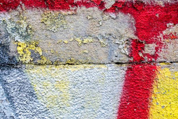 istock colorful grunge cracked paint concrete wall texture background 1032560802
