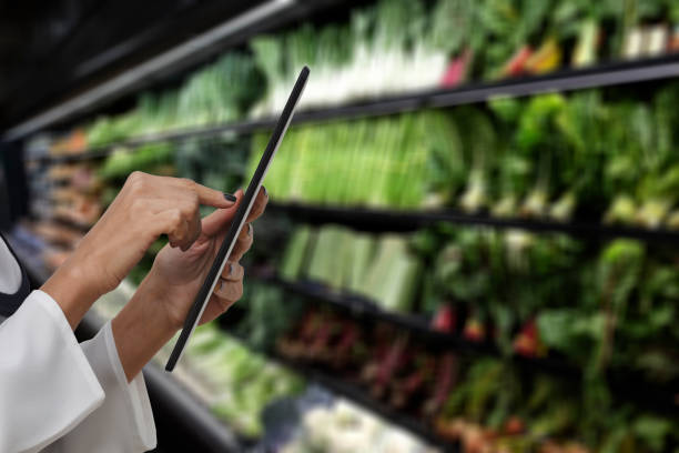 istock Woman checking shopping list on tablet 1032561128