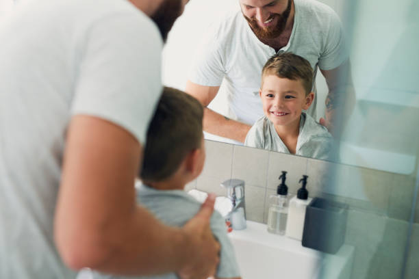istock My little boy is getting big, reaching the basin already 1032562100