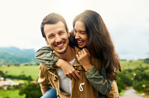 Cropped shot of a playful couple spending the day outdoors