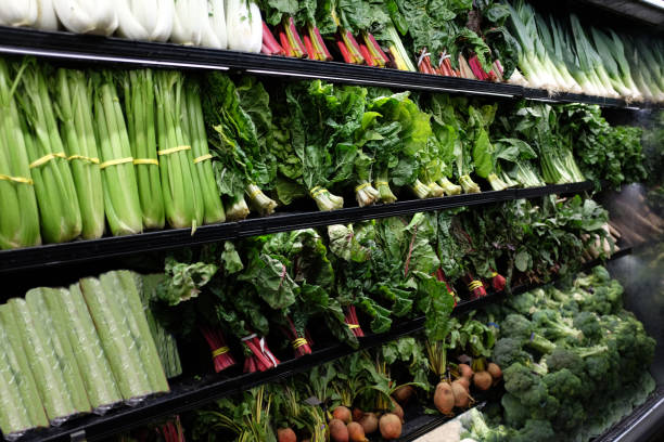 istock Organic vegetable aisle in grocery store 1032567222