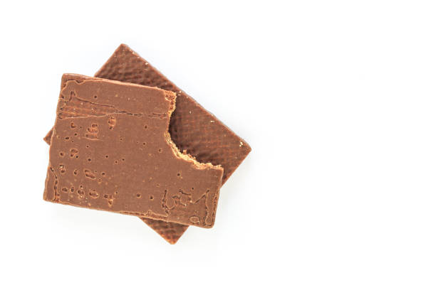 istock wafer chocolate dessert pile on white background 1032567394
