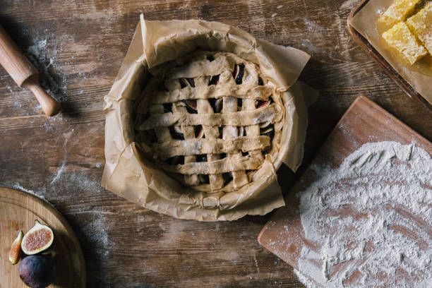istock top view of uncooked fig pie with ingredients around on rustic wooden table 1032573190