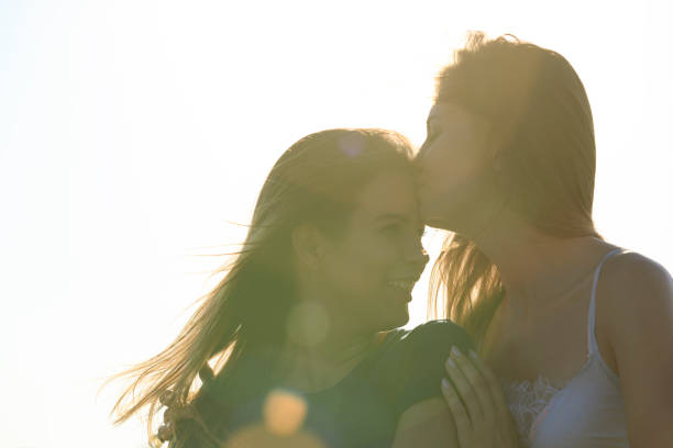 istock Lesbian couple at romantic date 1032577642