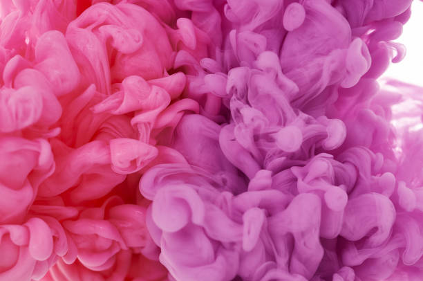 istock Ink in water. Splash paint mixing. Multicolored liquid dye. Abstract background color 1032581544