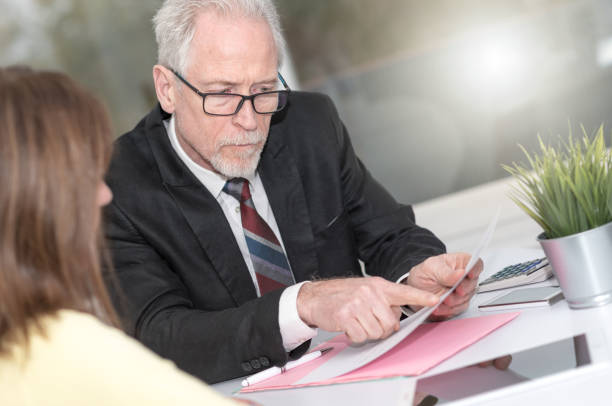 istock Woman meeting a consultant for advices, light effect 1032581776