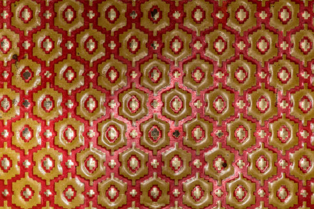 istock Metallic texture of red and yellow hexagons. Pattern. Retro look, old and shiny. 1032581876