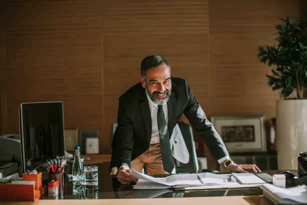 istock Senior businessman in office 1032581964