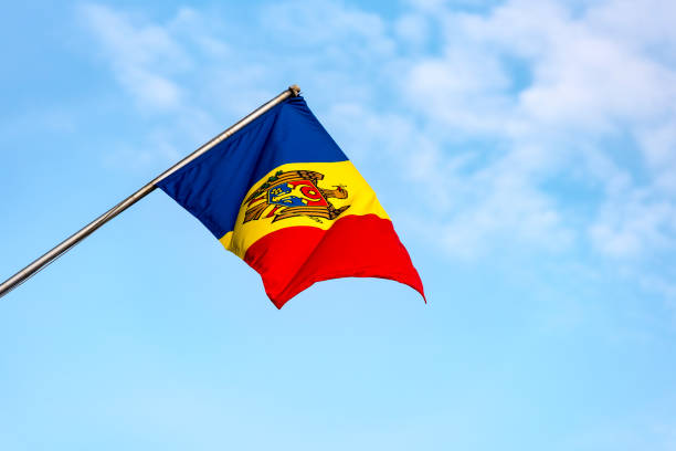 istock Moldovan flag against blue sky, high resolution Picture 1032590300