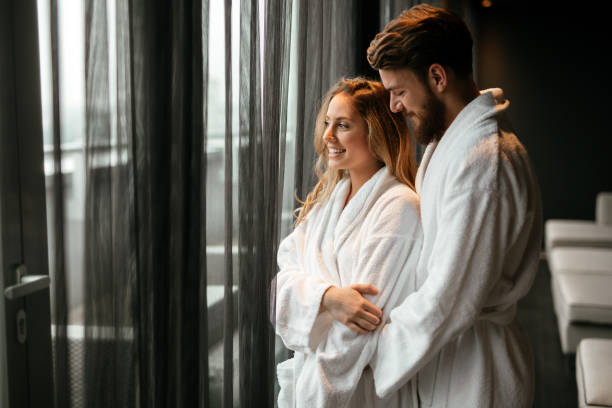 istock Couple relaxing in bathrobe 1032591160