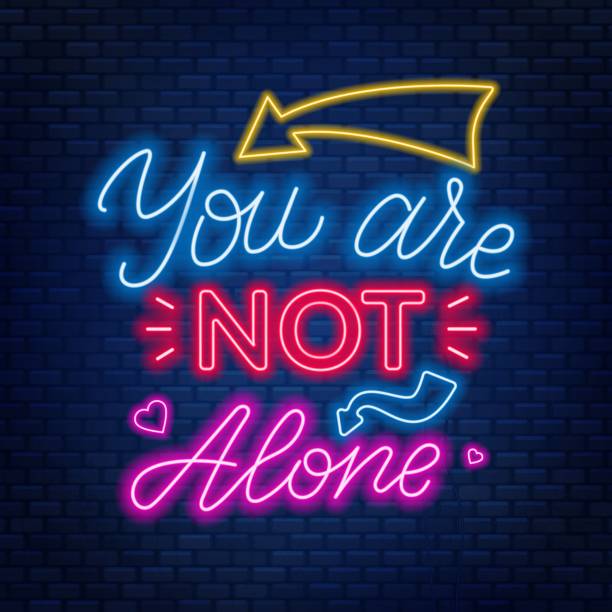 Neon lettering you're not alone. Motivational quote. Neon lettering you're not alone. Motivational quote for people in difficult life situation. you are not alone stock illustrations