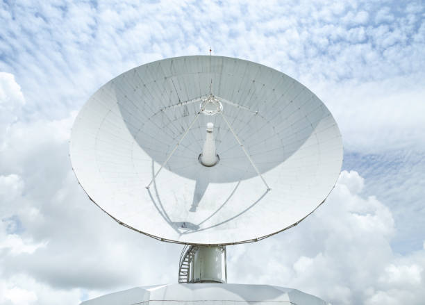 istock large white satellite dish turn up skyward on blue sky 1032596028