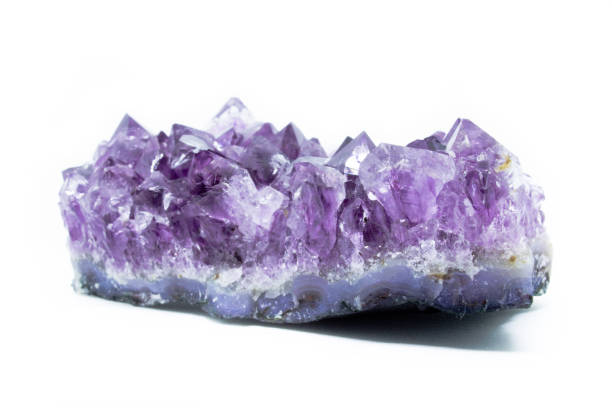 istock Natural Druse of amethyst on a white background 1032607820