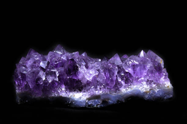 istock Natural Druse of amethyst on a black background front view 1032608336