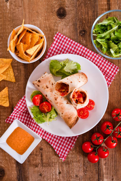 istock Tortilla wraps with chicken and vegetable. 1032609636