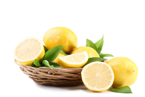 istock Ripe lemons in basket isolated on white background 1032613326