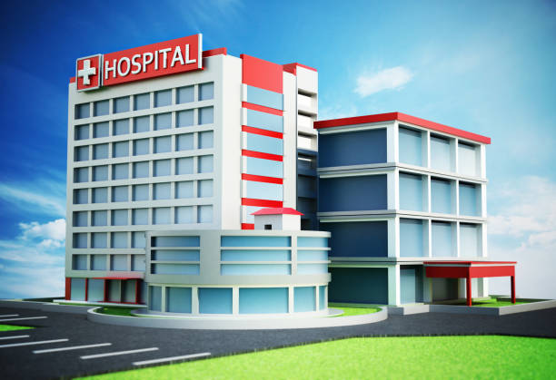 Generic modern hospital building exterior against blue sky.