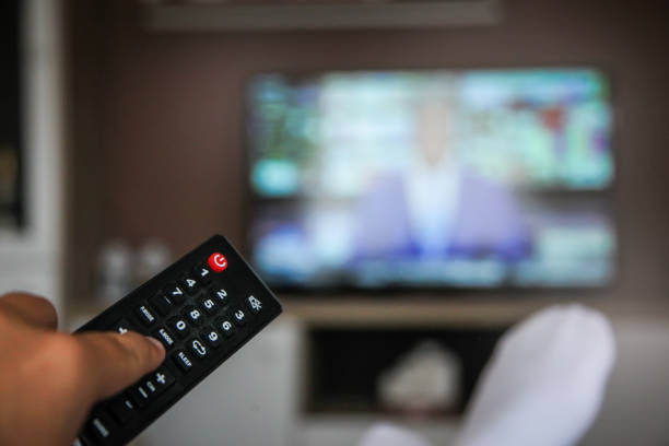 istock Looking the tv at home 1032614720