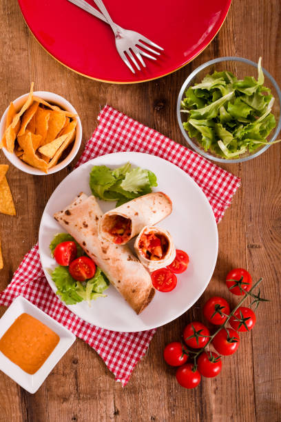 istock Tortilla wraps with chicken and vegetable. 1032628236
