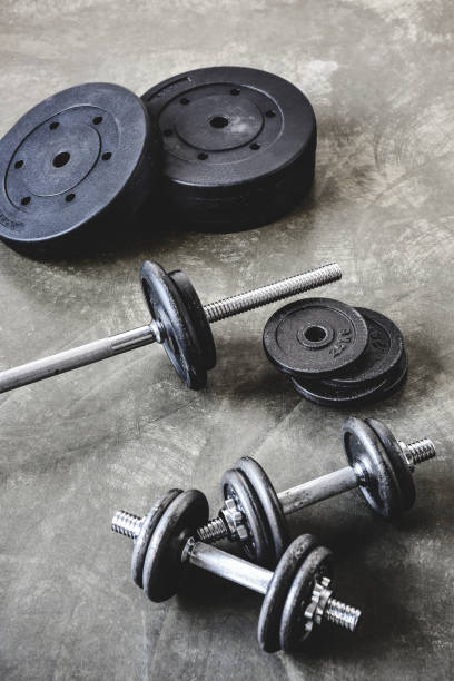 istock high angle view of gym equipment on concrete surface 1032632610