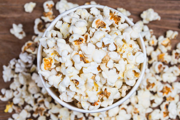 istock Salt popcorn on the wooden table, 1032637128